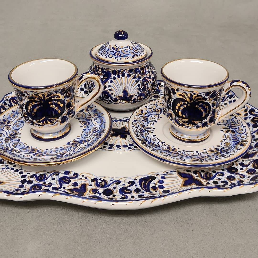 set of coffee cups in traditional Faenza ceramic decorated with pomegranate